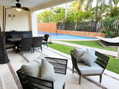Puerto Aventuras Apartamento | Spacious Apartment with Terrace, Pool and Beach Access