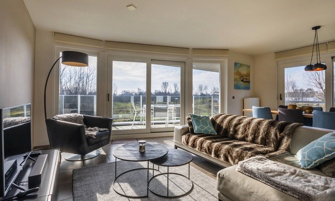 Koksijde-Bad Apartamento | Piso reciente y espacioso con vistas al molino