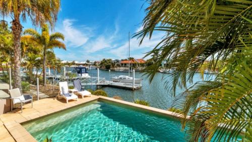 Banksia Beach Casa | Spacious Canal Home With Pool