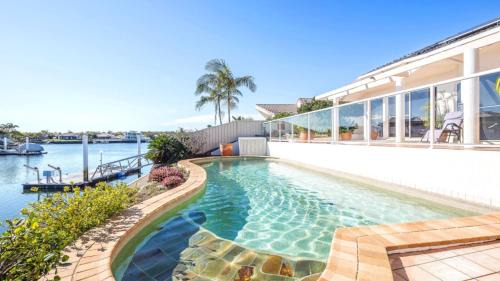 Banksia Beach Casa | Spacious Canal Home With Pontoon!