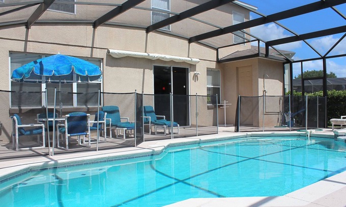 Kissimmee Casa | Amplia casa completamente amueblada con piscina climatizada y spa, a 25 minutos de Disney y Universal