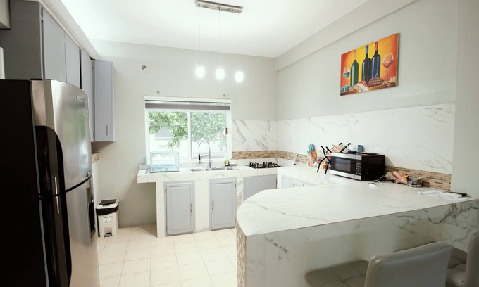 Corozal Apartamento | Spacious hotel suites with 8 bedrooms and WiFi, AC in charming Corozal