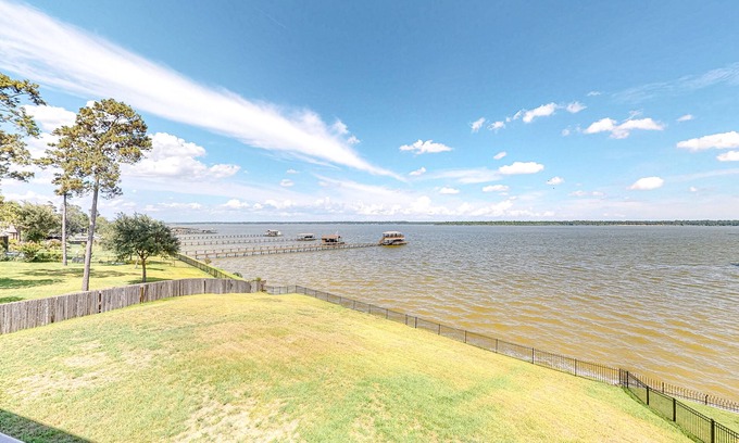 Lake Houston Casa | Spacious lakefront home with patio, grill, W/D, WiFi, & central AC