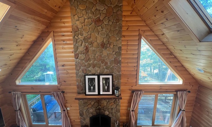 East Wakefield Casa | Spacious Lakefront Log Home for Family Fun & Relaxation- deck, firepit, gameroom