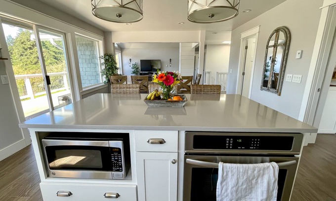 Eastsound Casa | Spacious & modern house with game room, outdoor firepit & peek-a-boo water views