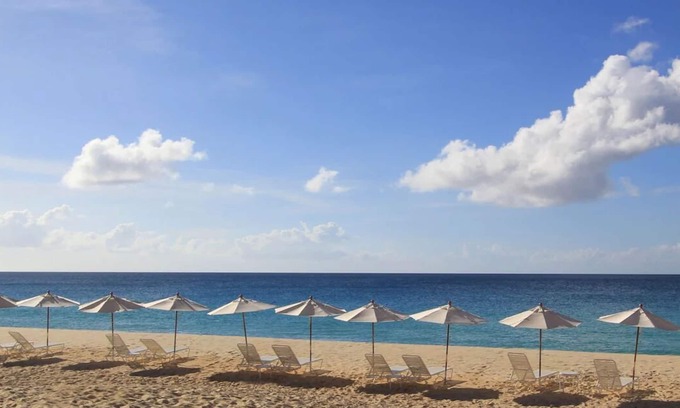West End Village Hotel | Spacious Room w/ Living Area and Full Kitchen | Steps Away from the Beach
