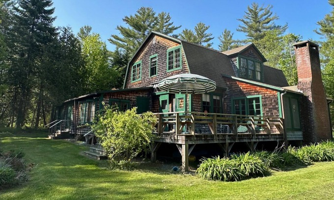 Greensboro Casa | Spacious, rustic getaway on Caspian Lake with two docks & lawn.