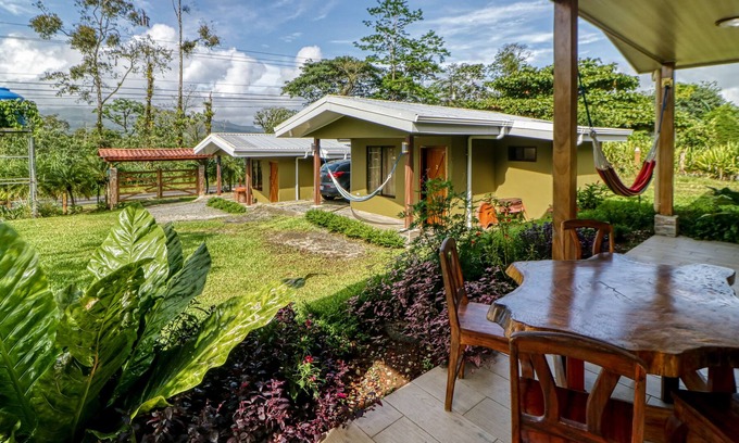 Aguas termales de Arenal Villa | Spacious villa near town with volcano views, fast WiFi & kitchenette
