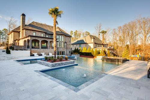 Suwanee Casa | Sprawling Suwanee Home Theater, Pool, Hot Tub!