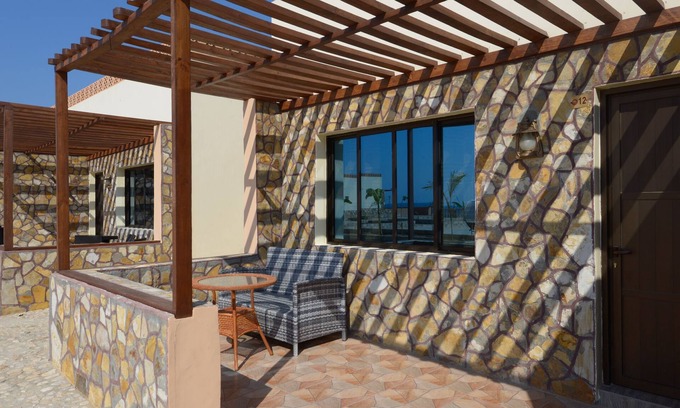 Mirbat Casa | Bungalow estándar con dos camas individuales, 66 m2.
