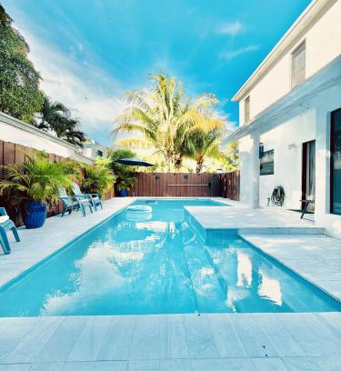 Coral Way Casa | Stay Central: Relax in Our Heated Pool Oasis