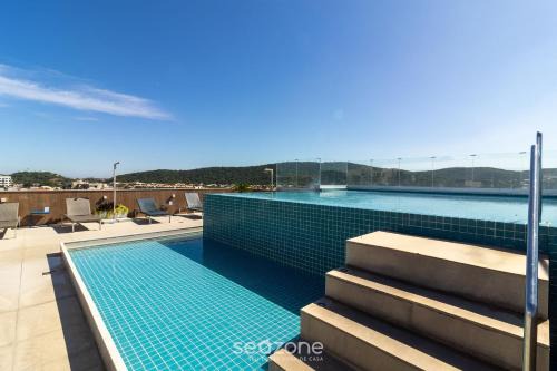 Passagem Apartamento | Estancia con piscina y sauna a pocos pasos de la playa en Cabo Frio - HSC