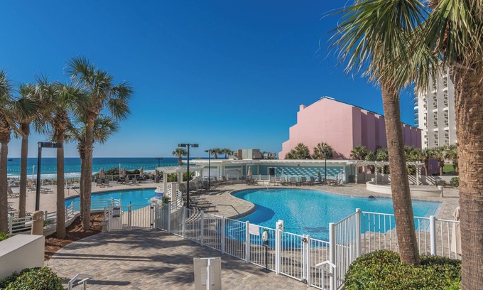 Four Mile Village Condominio | Steps to the Beach - Great for Families - Beach Front Building