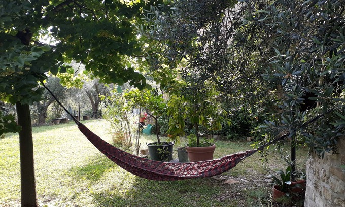 Rotella Casa | casa de piedra con jardín y huerto orgánico entre mar y montaña