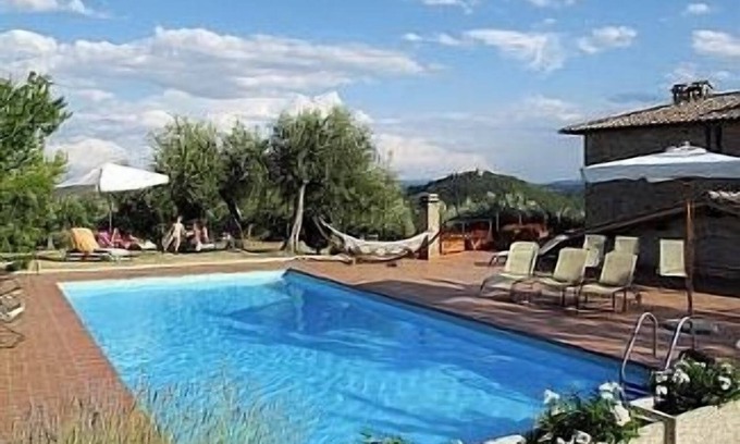 Teverina di Cortona Apartamento | La casa de piedra con piscina y barbacoa, con vista a Perugia y a Asís, cerca de los senderos