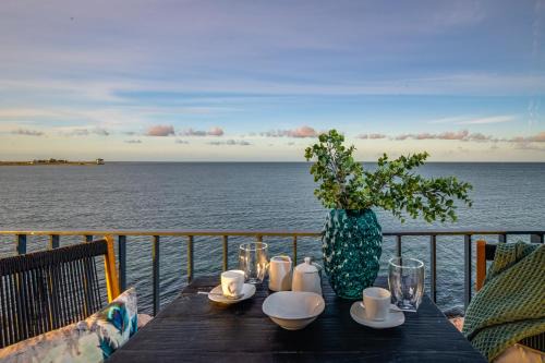 Olpenitz Apartamento | Strandfeder – Moderne Ostsee-Ferienwohnung für Drei im OstseeResort Olpenitz