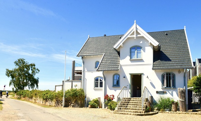 Fehmarnsund Condominio | Strandhaus-fehmarn, Captains-deck, Strandlage und Meerblick, Terrasse und Garten