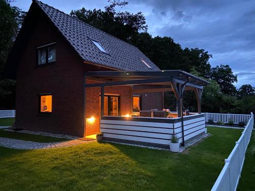 Muritz Casa | Strandhaus Mathea - ruhige Lage direkt am Fleesensee - Parkplatz, Kamin, Sauna - familienfreundlich