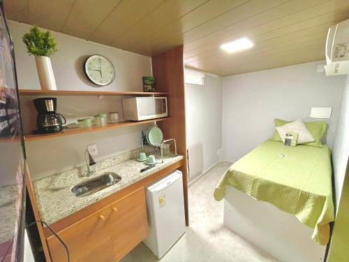 Macae Casa | STUDIO aconchego, com Ar, Wifi, Smartv e Cozinha