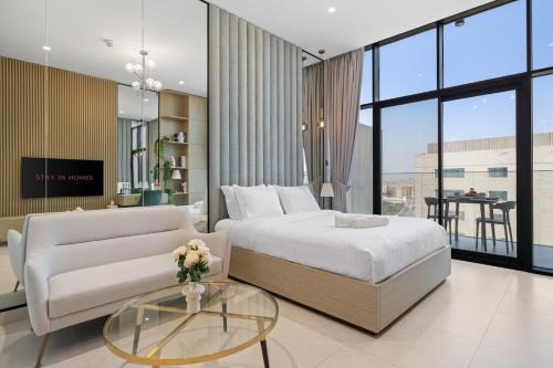 Discovery Gardens Apartamento | Studio Al Furjan by STAY IN HOMES - Marina 12min - Self checkin - Metro - Parking
