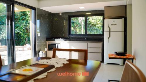 Delfinopolis Apartamento | Studio em Delfinopolis com praia privativa