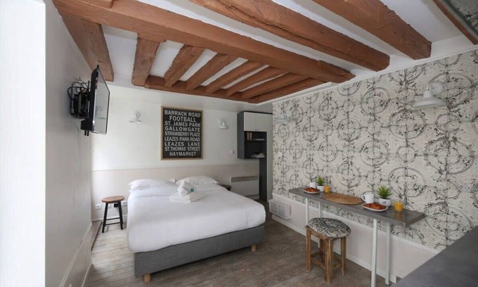 Vivienne Apartamento | Studio parisien 20m2 en face du musee Grevin - 2P