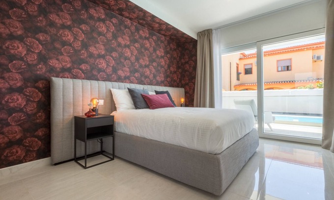 Villa San Pietro Apartamento | Estudio "Residence Meridian Unità 3" Cerca de la playa con vistas a la montaña, piscina y Wi-Fi