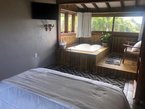 Praia do Rosa Cabina | Studios do Barão - Conforto e privacidade em meio à natureza