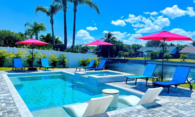Tropic Palms Casa | Stunning Delray Waterfront Oasis Heated Pool, Spa, Canal, Huge Patio, Pool Table