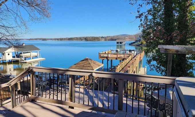 Penhook Casa | Stunning lake front with private dock and pontoon boat available for rent