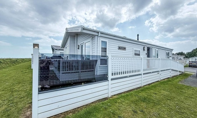 Hopton Cabina | Stunning lodge with full sea views and decking at Broadland Sands ref 20076CF