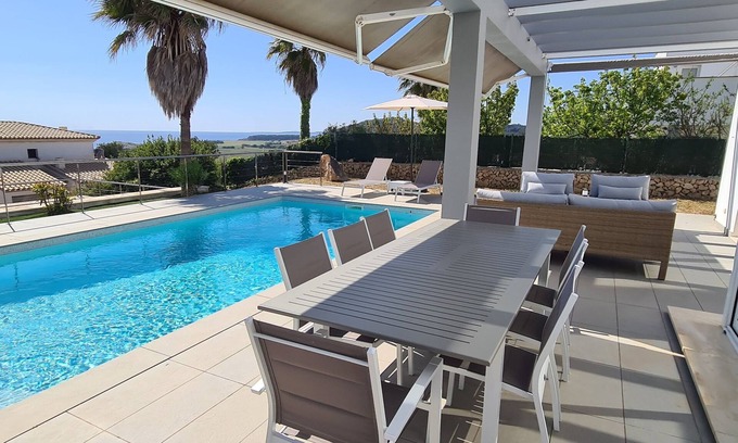 Sant Jaume Mediterrani Casa | Stunning modern villa with stunning Son Bou beach views, heated pool