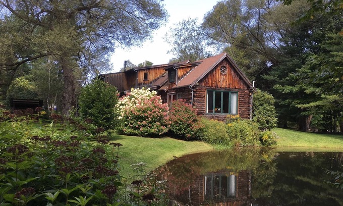 Andes Casa | Impresionante, aislada casa de troncos rodeada de bosques y agua