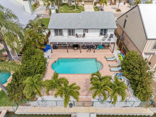 Indian Rocks Beach Casa | Stunning Waterfront Pool Home Walk to Beach & Restaurants Large Private Pool