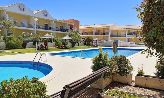 Vale de Parra Apartamento | Apartamento de lujo de 2 dormitorios con aire acondicionado y piscinas comunitarias, cerca de la playa.