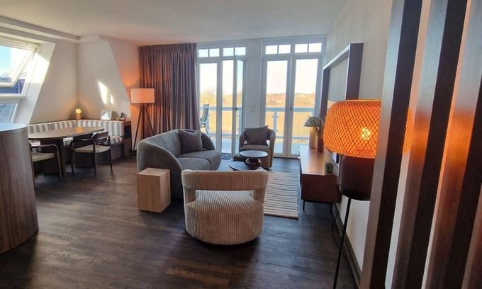 Wremen Apartamento | Stylish and spacious penthouse vacation apartment with sauna and North Sea view -