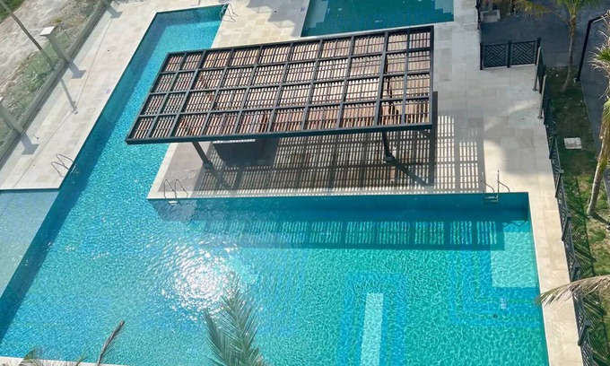 Pozos Colorados Apartamento | Apartamento elegante en ubicación frente al mar con impresionantes vistas