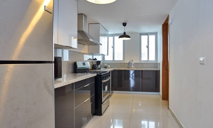 La Arboleda Apartamento | Elegante apartamento ubicado en el centro, gimnasio, terraza, jacuzzi
