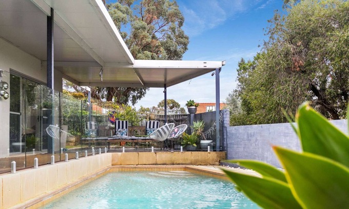 City Beach Casa | Stylish family and pet friendly 4 BR home with pool close to beach