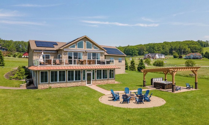 Waterfront Greens Casa | New! Caddyshack: Lake Access, Fireplace, Hot Tub, Fire Pit!