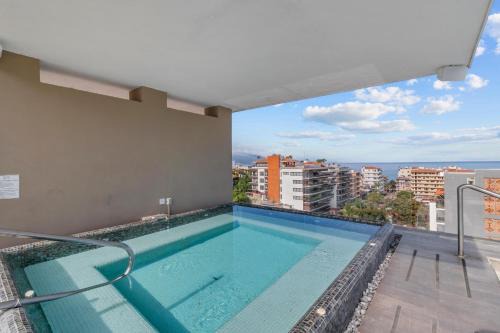 Emiliano Zapata Casa | Stylish Loft | Workspace, Rooftop Bar & Gym