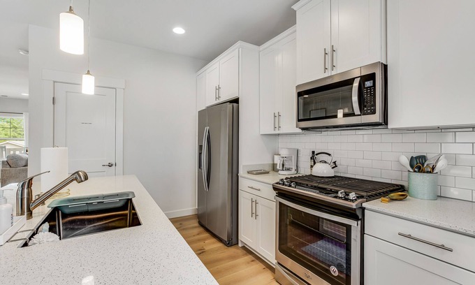 Allyn Casa | Stylish, two-story home with a washer/dryer & furnished porch - dogs welcome