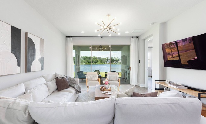 DeBary Casa | Stylish waterside retreat - springs nearby - pool and gym access - large groups