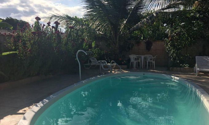 Bairro da Enseada Casa | Suíte 4 para PcD com piscina em Caraguatatuba