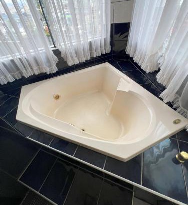 Sinop Casa | Suíte de luxo no centro com closet e hidromassagem