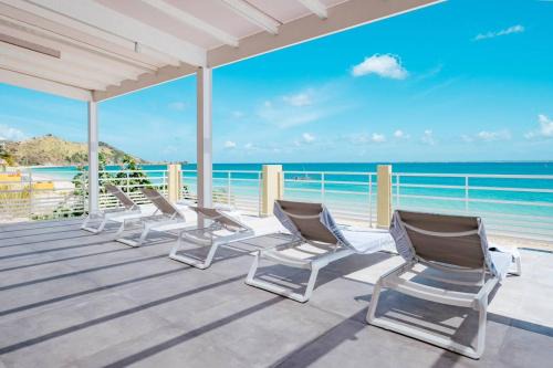 Grand Case Apartamento | Suite 1 - Les pieds dans le sable de Grand-Case, un bien nouveau et rare dans la toute nouvelle résidence Mogador
