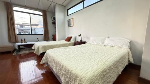 Cooperativa de Empleados del Consejo Provincial Casa | SUITE 2 CAMAS, TV, WIFFI, PARKING, a 3 MINUTOS DEL AEROPUERTO DE GUAYAQUIL, LAS GARZAS SAN MARINO SHOPPING