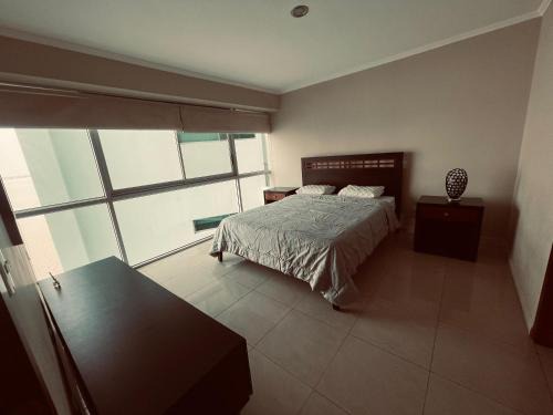 Las Peñas Apartamento | Suite frente al río en Puerto Santa Ana Riverfront
