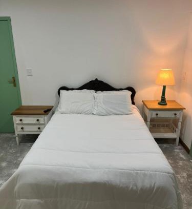 Areal Casa | Suite IPÊ ROSA