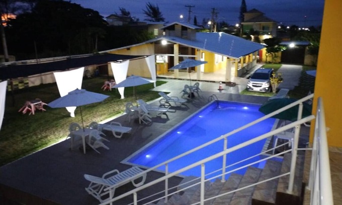 Barra Nova Apartamento | Suite with queen-size bed, smart TV, air conditioning, minibar and bidet
